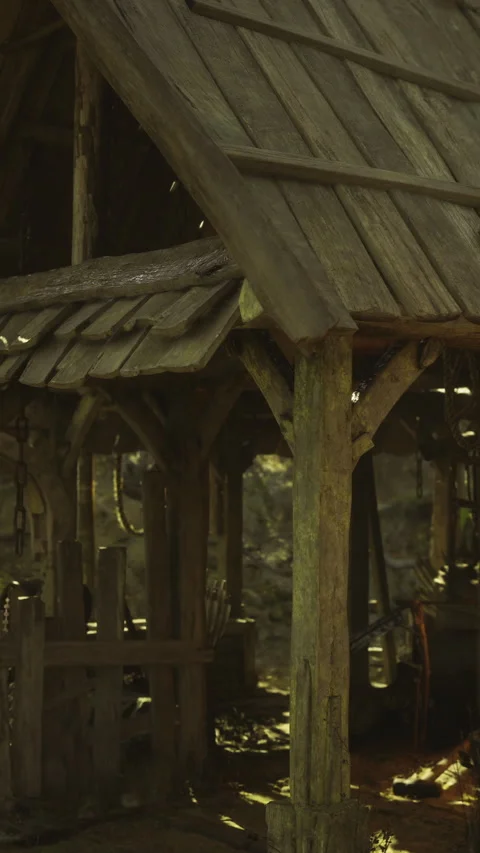 Warm sunlight casts golden hues in the rustic barn of the countryside Stock Footage 331831559