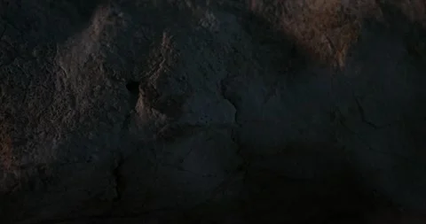 Warm Sunrise rays on Rugged Stone Surface. Stock Footage 270522182