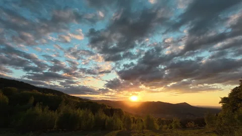 Warm sunset in beautiful mountains at spring time Stock Footage 326875539