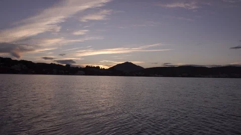 Warm sunset clouds over gentle sea landscape in Corfu Greece Stock Footage 96723244