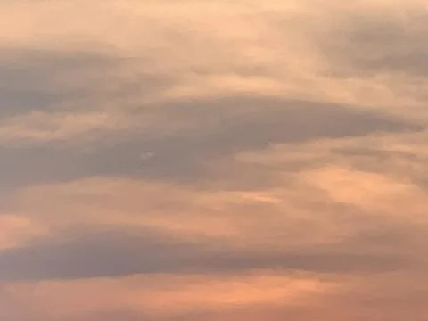 Warm Sunset Cloudscape with Layered Evening Colors in Jakarta Indonesia Stock Photos