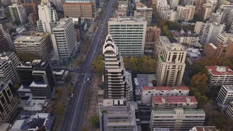 Warm sunset drone orbit over Apoquindo tiered tower Santiago Chile 库存影片 334637210