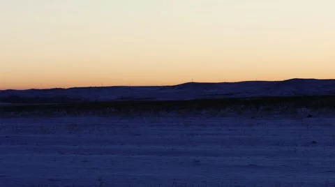 Warm Sunset Glow over Snow Fields Vidéo 58688464