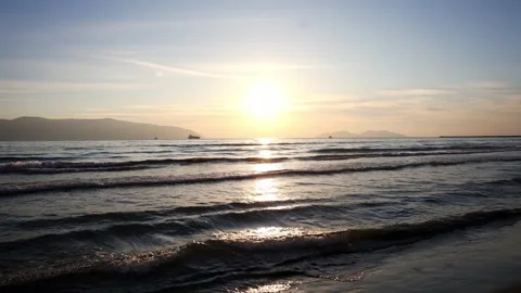Warm Sunset Sea with Distant Ship and Reflection Stock Footage 331888001