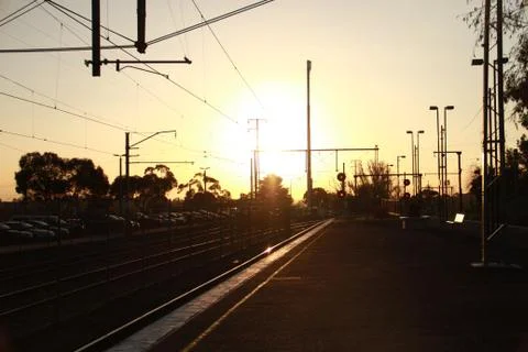 Warm sunset at the train station Photos