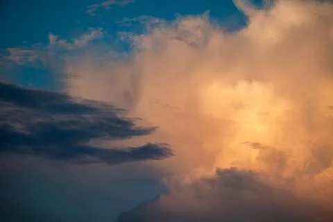 Warm sunshine on the white clouds Stock Photos