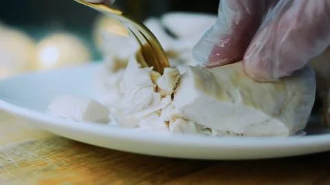 Warm tabletop study: shredding chicken for mexican soup Stock Photos