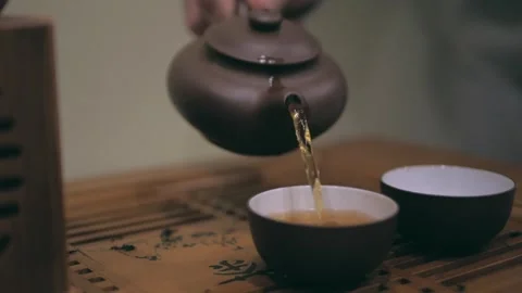 Warm Tea in Ceramic Cup: Cozy Morning Lifestyle 4K Stock-Footage 339275364
