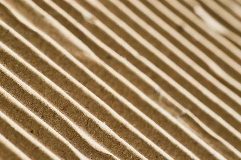 Warm Toned Abstract Texture with Diagonal Ridged Pattern Stock Photos