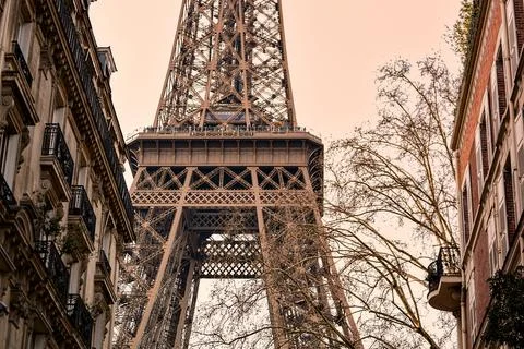 Warm Toned View of the Eiffel Tower and Parisian Apartments Stock Photos