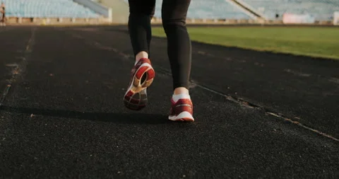 Warm Up before training. jogging in stadium close up Stock Footage 139831782