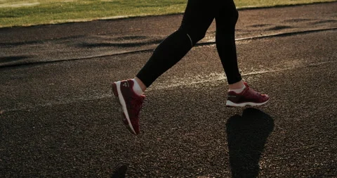 Warm Up before training. jogging in stadium close up Stock Footage 139832161