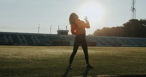 Warm Up before training. jogging in stadium close up Stock Footage 139832403
