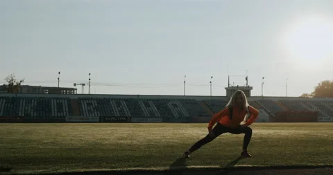 Warm Up before training. jogging in stadium close up Stock Footage 139832793