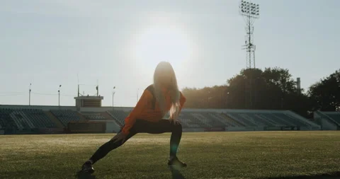 Warm Up before training. jogging in stadium close up Stock Footage 139832805