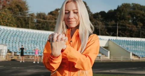 Warm Up before training. jogging in stadium close up Stock Footage 139832993