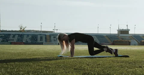 Warm Up before training. jogging in stadium close up Stock Footage 139833312