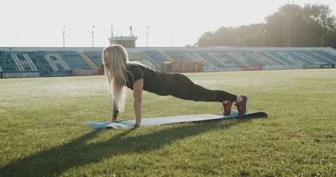 Warm Up before training. jogging in stadium close up Stock Footage 139833467