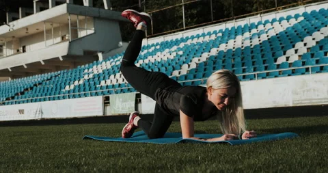 Warm Up before training. jogging in stadium close up Stock Footage 139833563