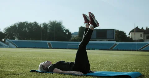 Warm Up before training. jogging in stadium close up Stock Footage 139834029