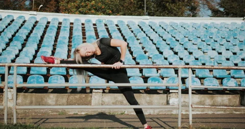 Warm Up before training. jogging in stadium close up Stock Footage 139834237