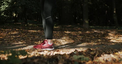 Warm Up before training. jogging in stadium close up Stock Footage 139878554