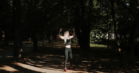 Warm Up before training. jogging in stadium close up Stock Footage 139878679