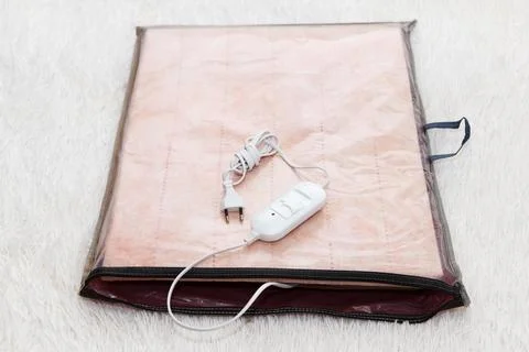 A warm two-sided new electric sheet, lies assembled in packaging, and on to.. Stock Photos