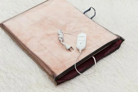A warm two-sided new electric sheet, lies assembled in packaging, and on to.. Stock Photos