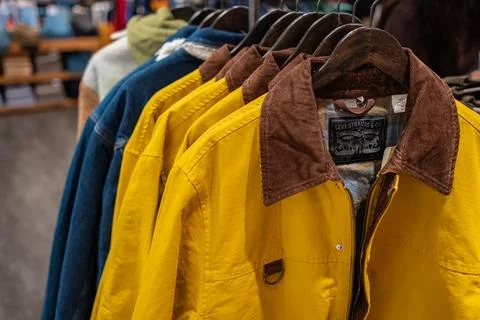 Warm winter Jackets on display in a Levi's store American clothing company Stock Photos