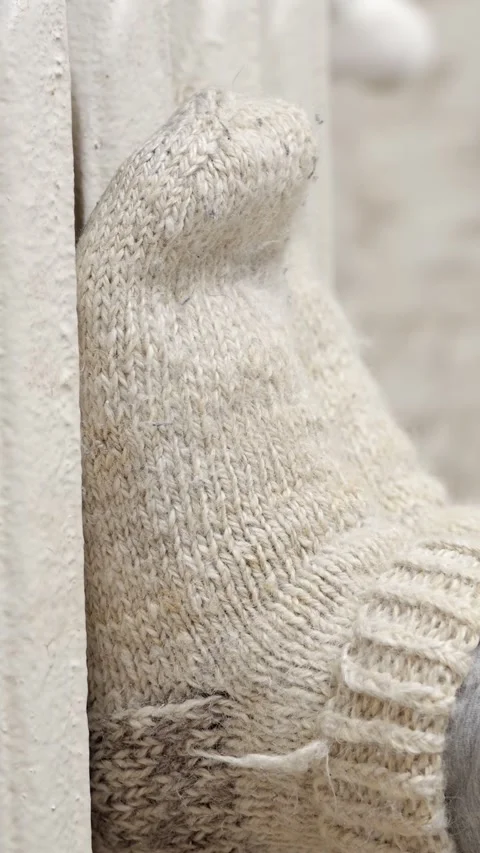 Warm Wool Socks Cover Feet Resting Directly Against White Heating Radiator Stock Footage 346764982