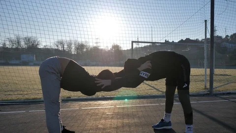 Warm - up of young athletes before training. morning fitness Stock Footage 125750413