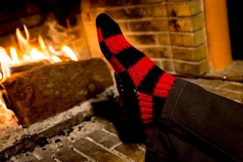 Warming in a fireplace Stock Photos