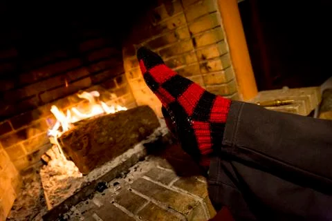 Warming in a fireplace Stock Photos