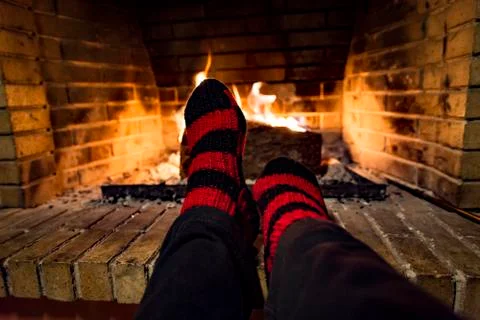 Warming in a fireplace Stock Photos