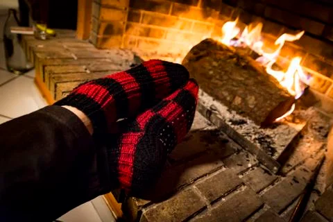 Warming in a fireplace Stock Photos