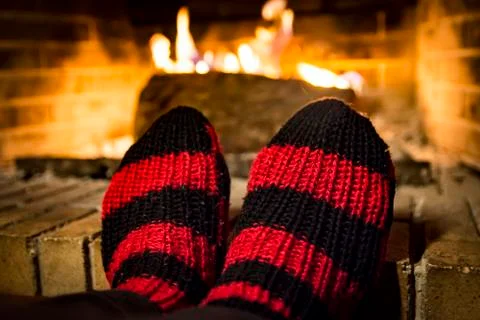 Warming in a fireplace Stock Photos