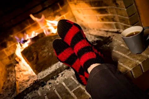 Warming in a fireplace Stock Photos