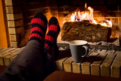 Warming in a fireplace Stock Photos