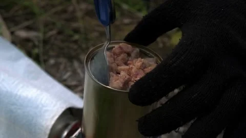 Warming up food on a hike Stock Footage 208339757