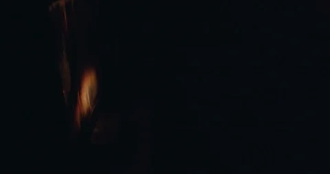 Warming hands by fire fireplace Stock Footage 127636556