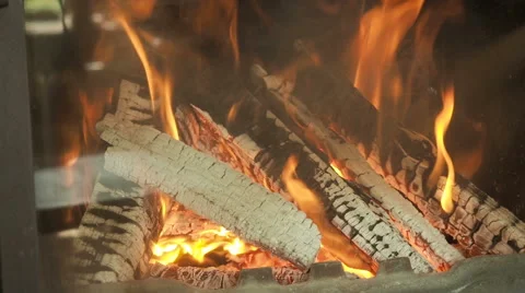 Warming hands by a fireplace. Stock Footage 62237620