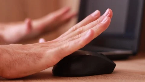 Warming hands up while working with computer mouse Stock Footage 88763967