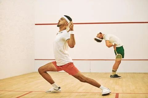 Warming up prepares you physically and mentally for the game. two young men Stock Photos