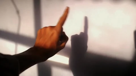 Warn hand sign white background with shadow behind it. Stock Footage 289922722