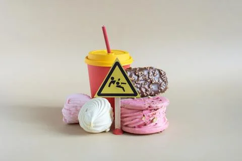 Warning about the danger of consuming a large number of confectionery Stock Photos