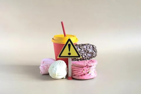 A warning about the dangers of consuming large amounts of sweet confectionery. Stock Photos