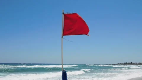 Warning about the prohibition of swimming red flag on the beach. Cyprus. Stock Footage 154394489