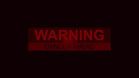 Warning danger ahead sign for safety and security Stock Footage 295587941