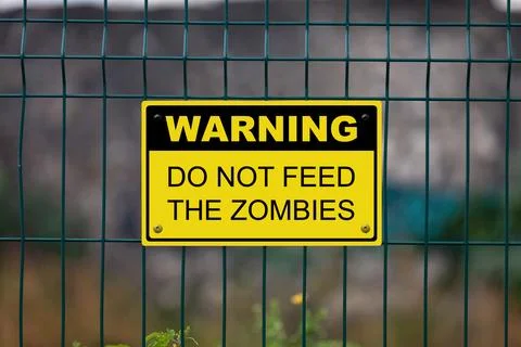 Warning - Do not feed the zombies Foto stock